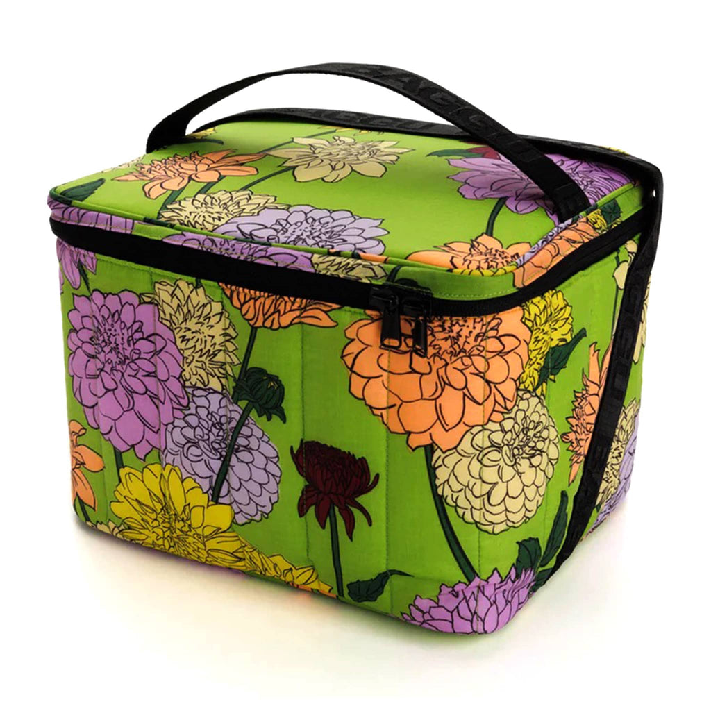 Baggu Insulated Puffy Cooler Bag with Dahlia print on a green backdrop with black zipper, shoulder strap and handle, front angle view.