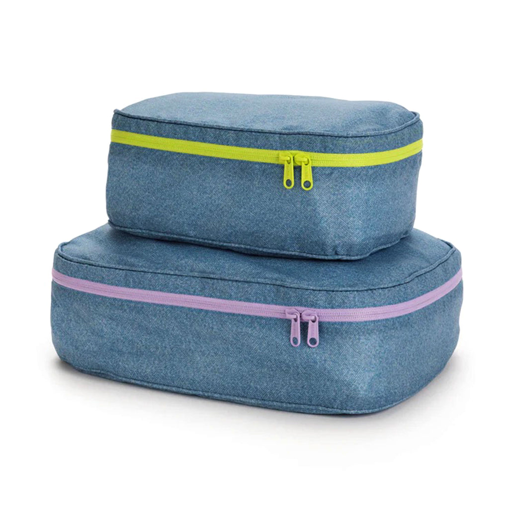 Baggu reusable recycled ripstop nylon packing cube set of 2 in digital denim print, large cube has a lilac zipper and the small cube has a chartreuse zipper, both are stuffed and stacked.