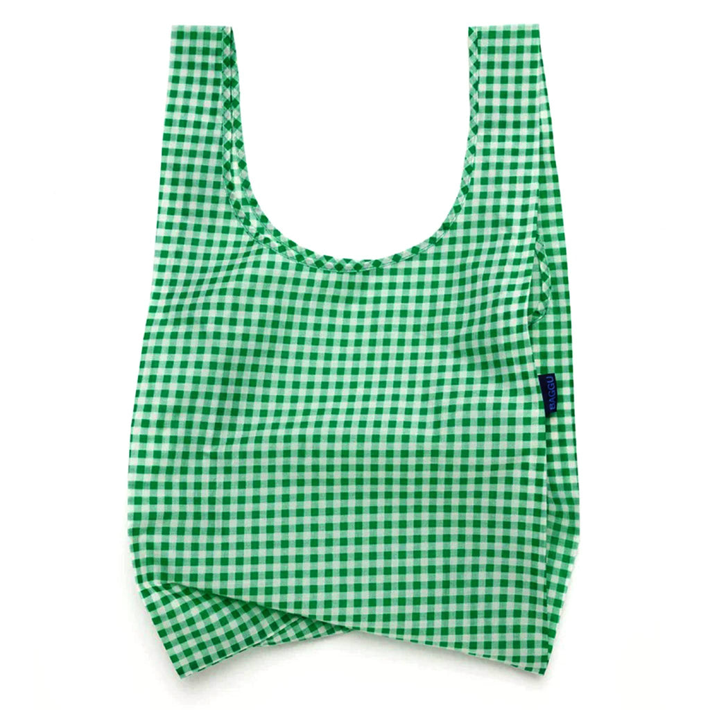 Baggu standard size eco-friendly recycled ripstop nylon reusable tote bag with green and white gingham, unfolded.