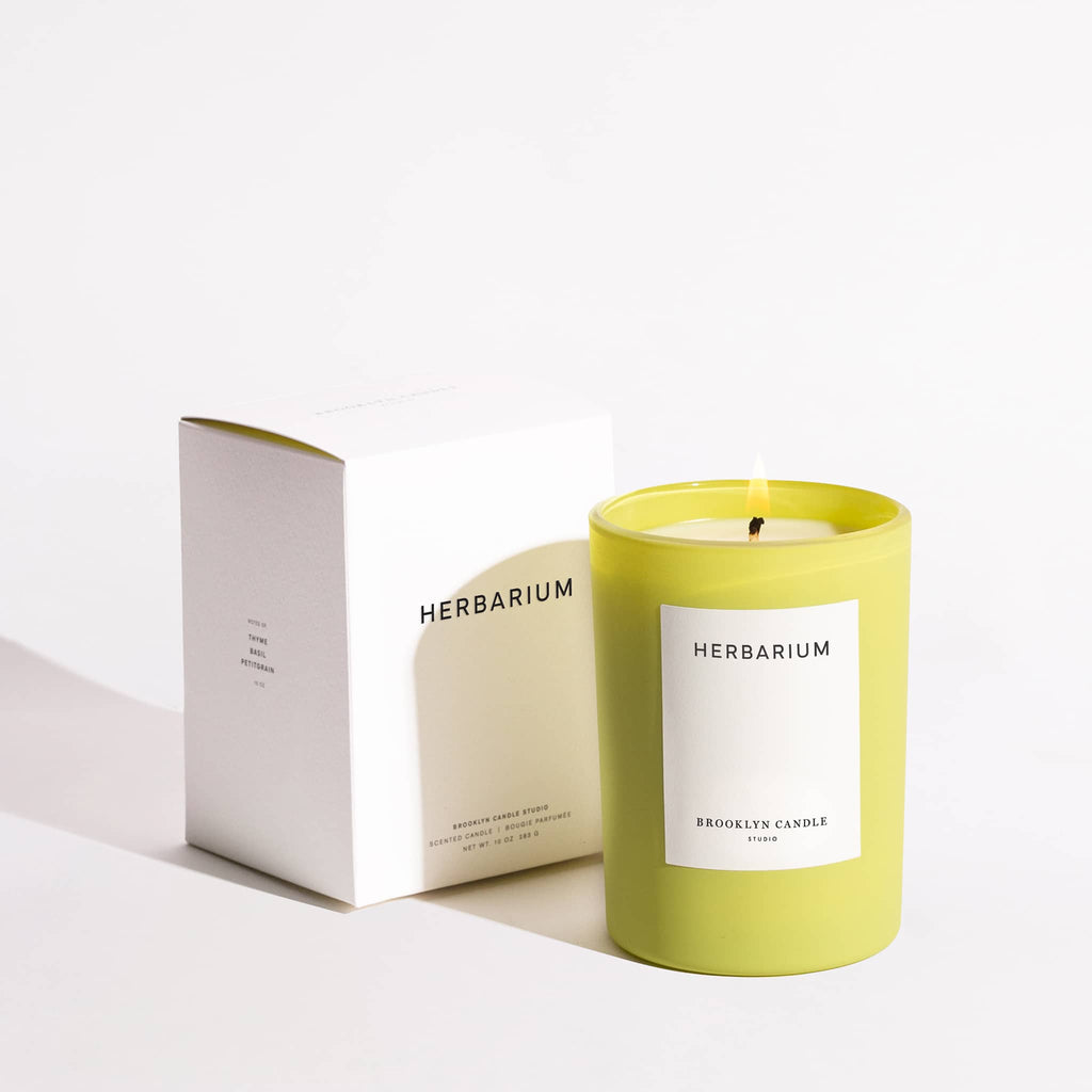 Brooklyn Candle Studio Limited Edition Herbarium Summer Collection, Herbarium scented soy wax candle in chartreuse glass vessel with white gift box.
