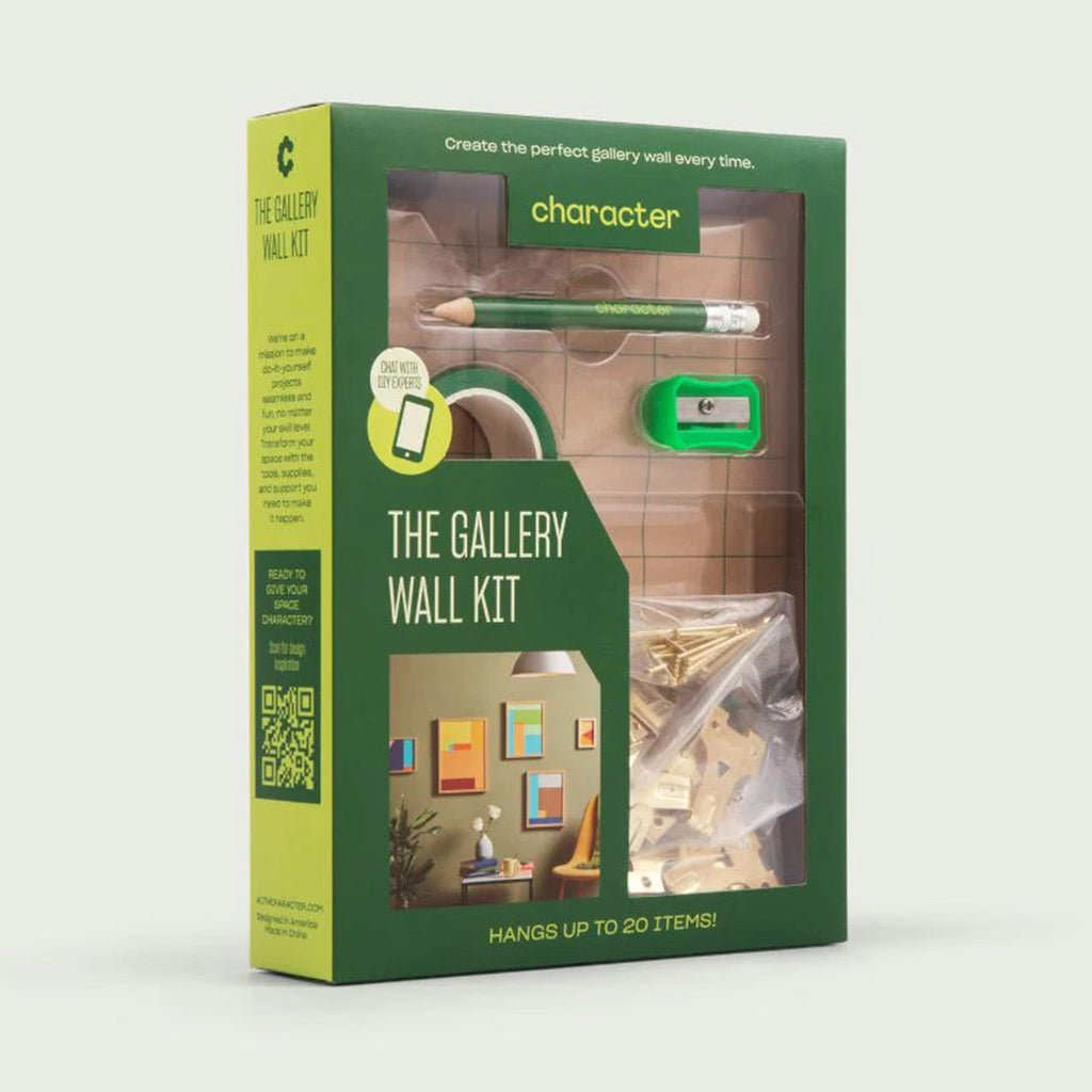 Character The Gallery Wall Kit with planner and picture hanging hardware in green box packaging, front view.