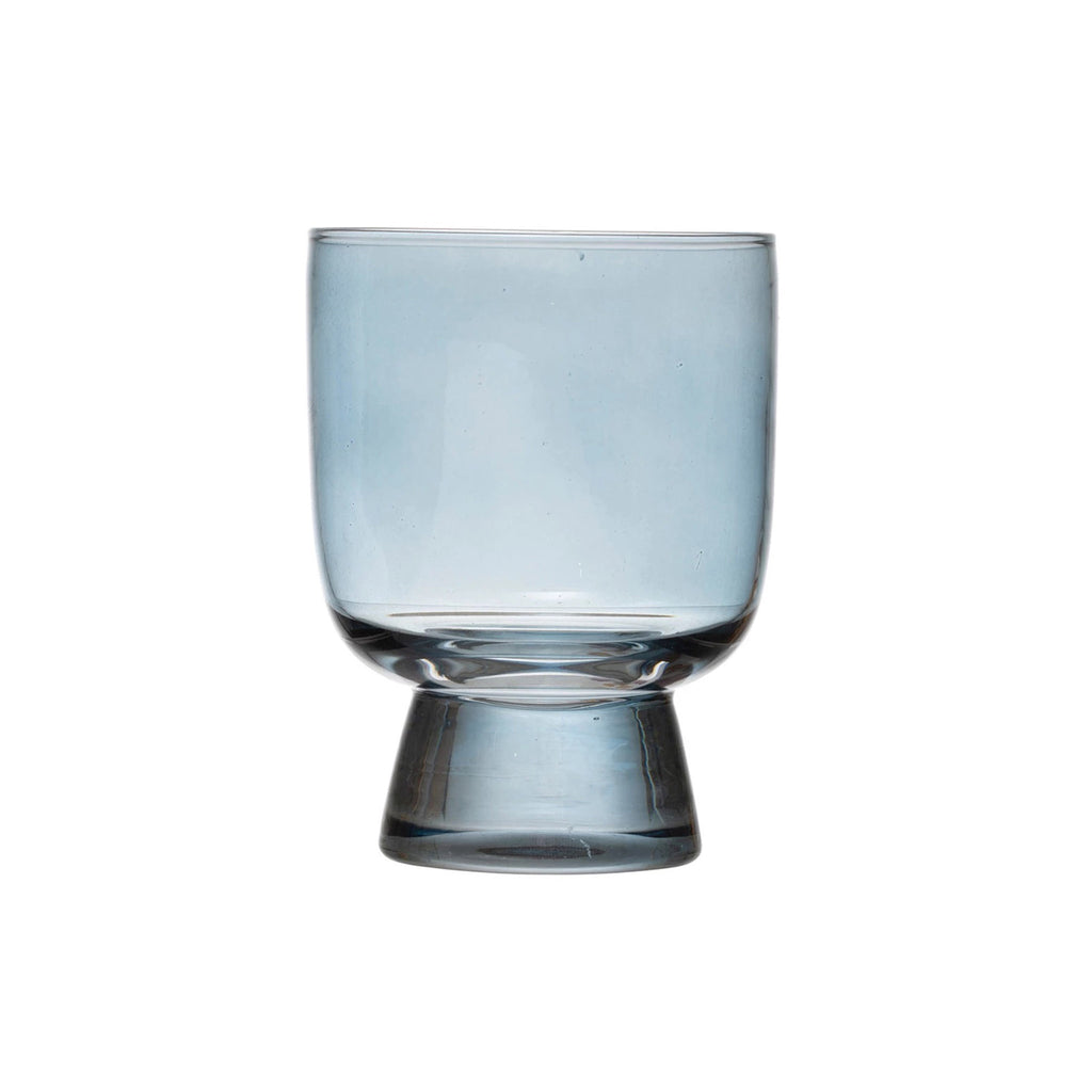 Creative Co-op pale blue 6 ounce round footed drinking glass.