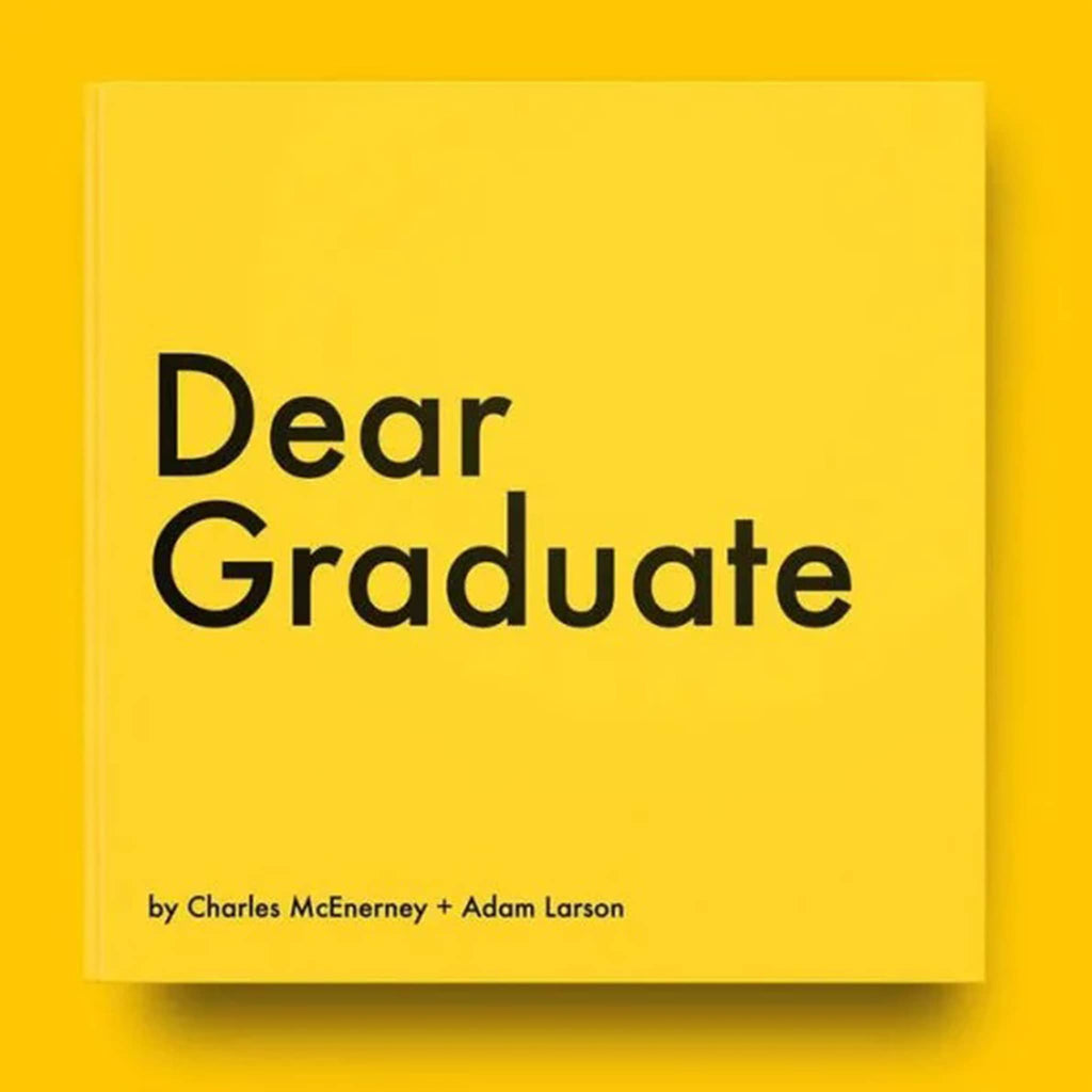 Dear Graduate hardcover book front cover with black type on a yellow background.
