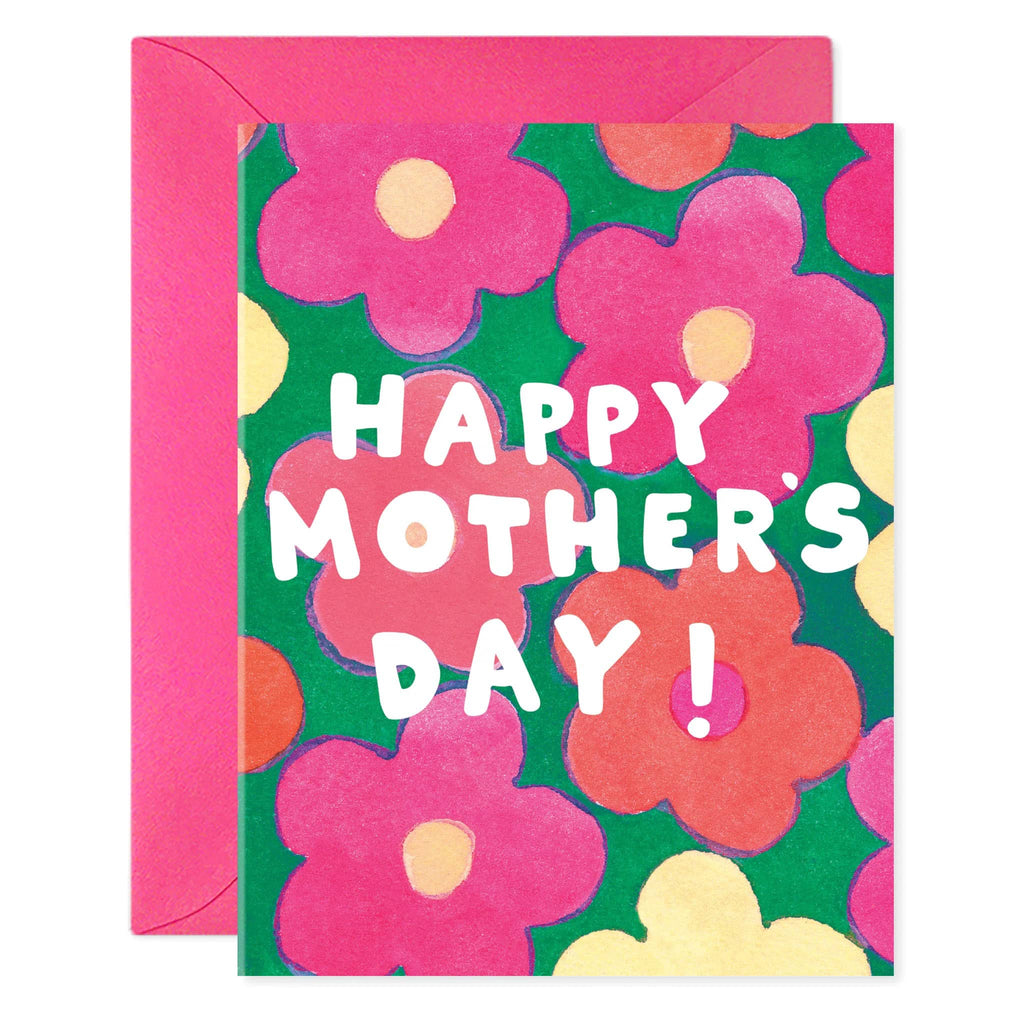 E. Frances Paper The Bold and the Beautiful greeting card with yellow, fuchsia and orange flowers on a green backdrop and "happy mother's day" in white lettering, front of card shown with a fuchsia envelope.