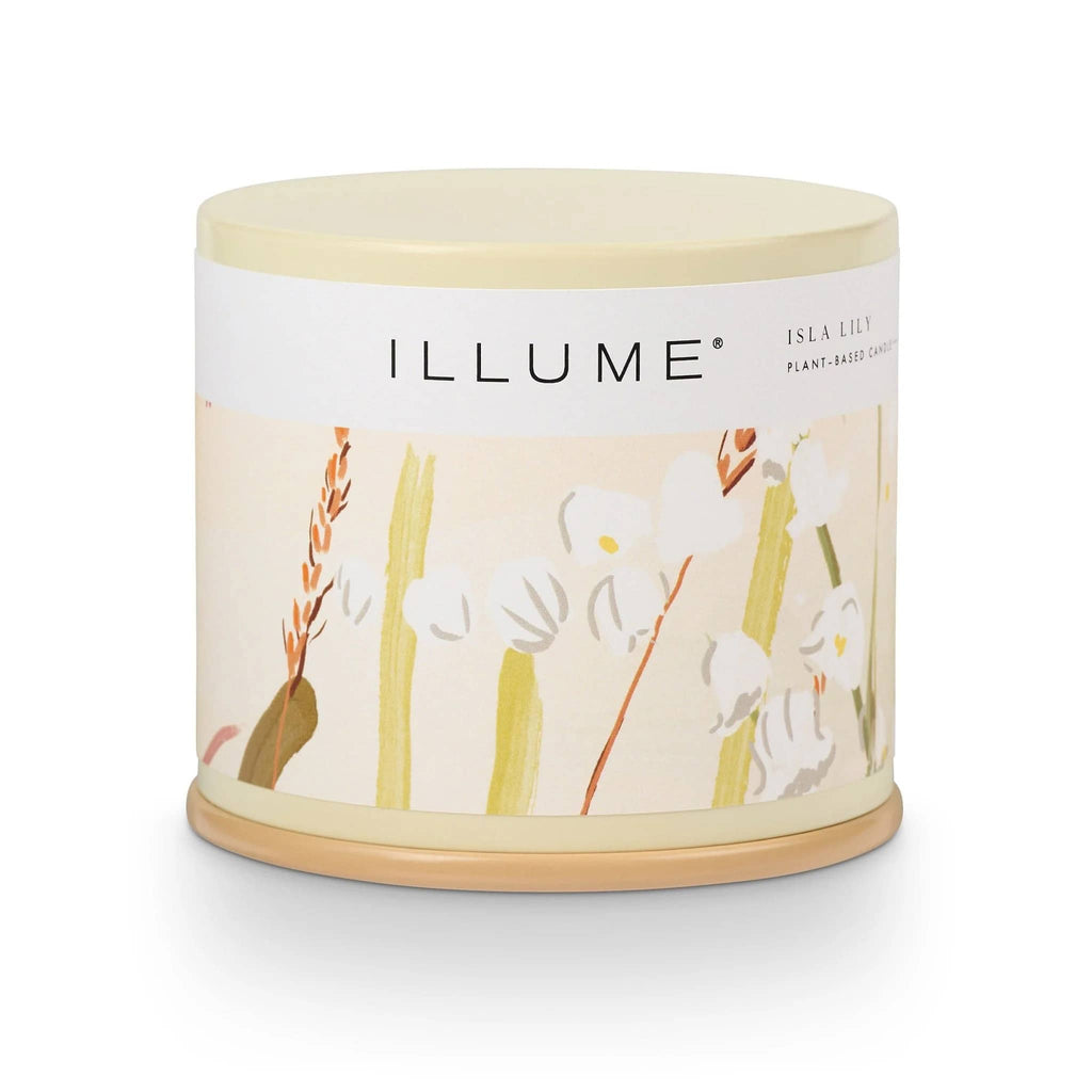 Illume Isla Lily scented plant based wax candle in large vanity tin, front view with lid on.
