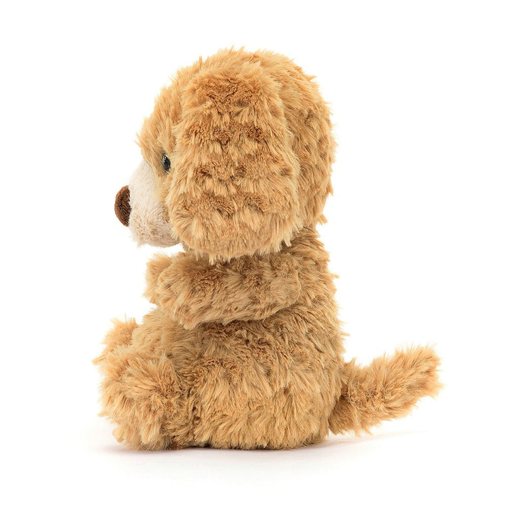 Jellycat Yummy Puppy plush toy with tan fur, black bead eyes and brown nose, side view.