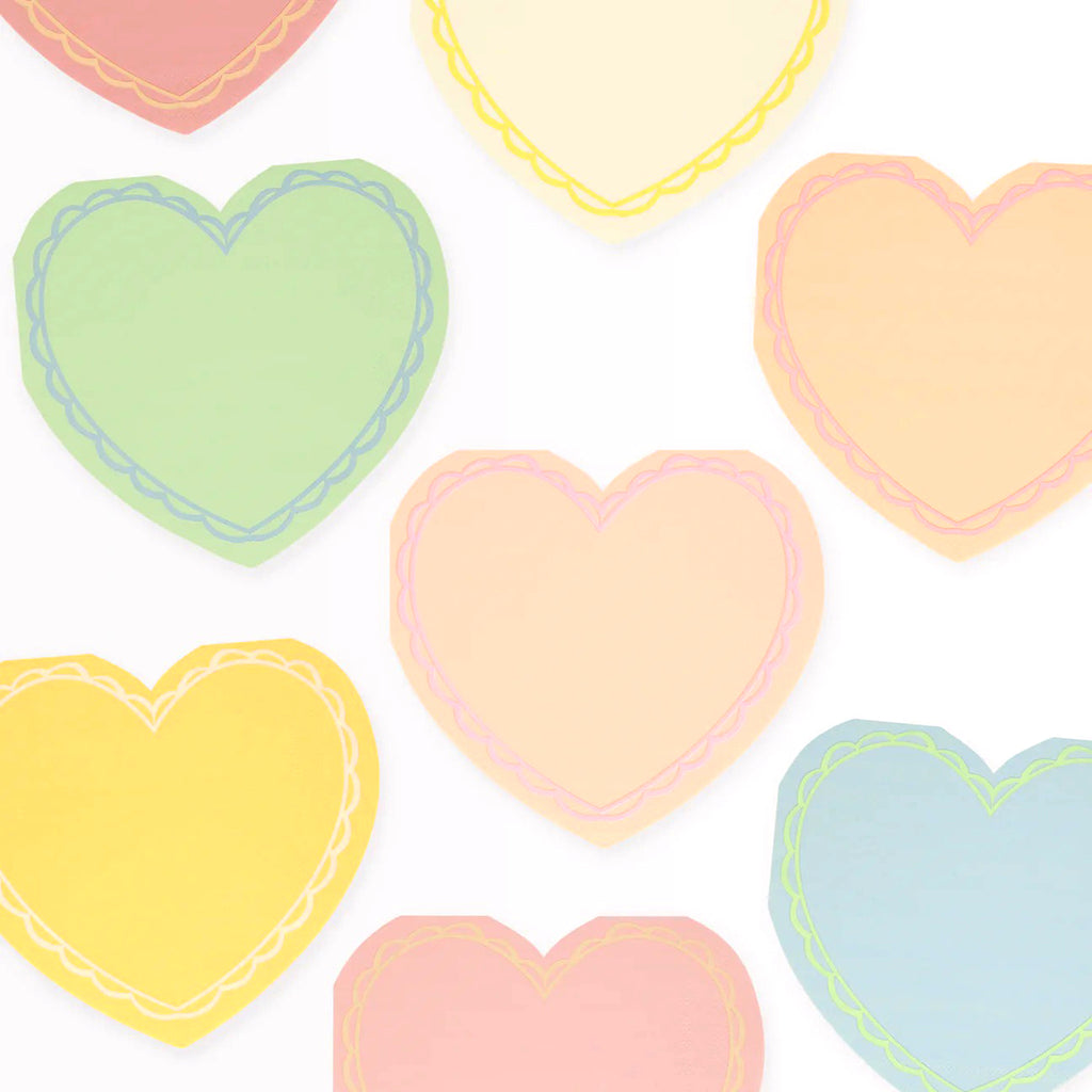 Meri Meri large pastel heart valentines day party napkins with contrasting color trim in a scalloped edge pattern.