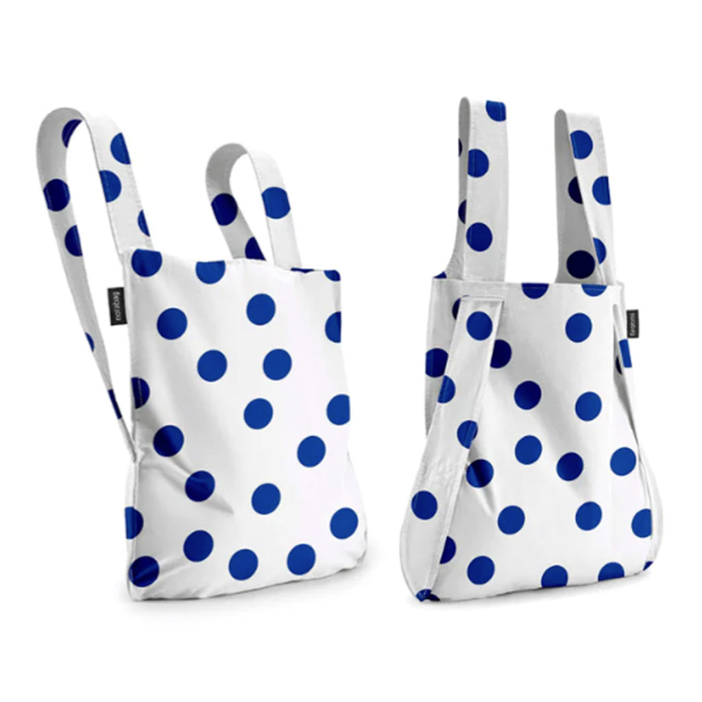 Notabag Marine Dots reusable convertible cotton and ripstop nylon bag that can be used as a backpack or tote, white with blue dots.