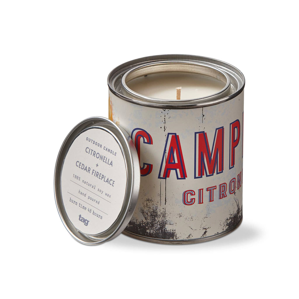 Tag Limited Citronella and Cedar Fireplace scented soy wax candle in tin with vintage inspired lettering in red and blue, lid off.