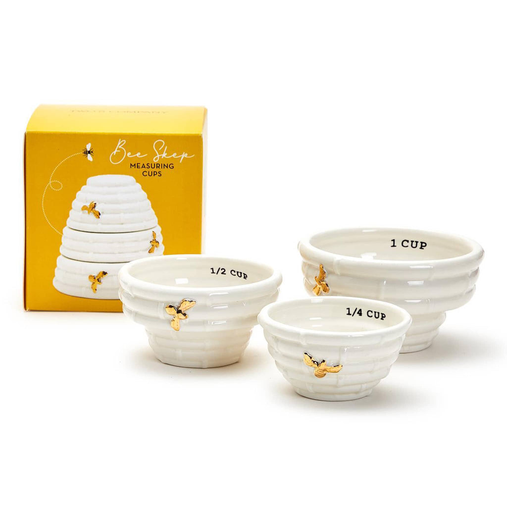 Two's Company Bee Step beehive measuring cups, set of 3 shown with yellow gift box.