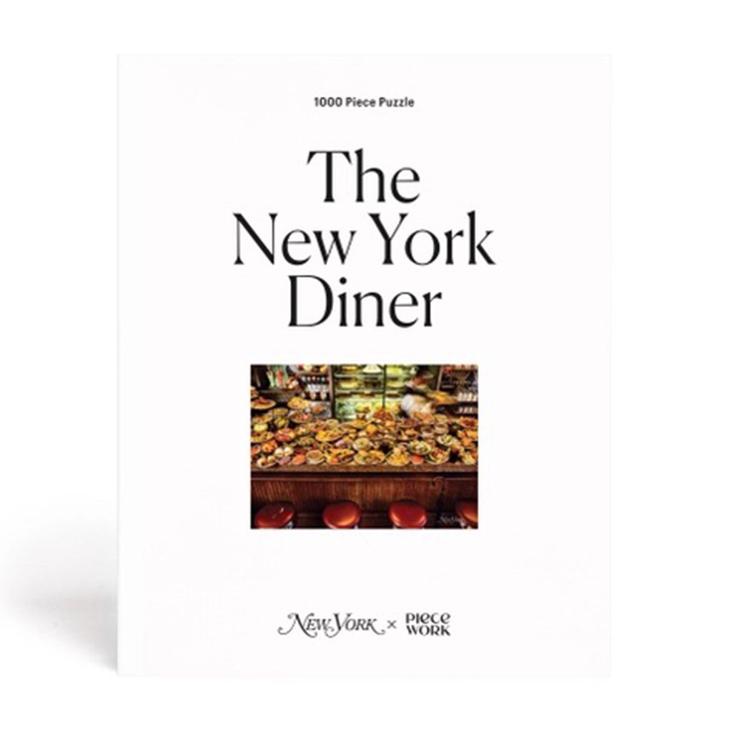 Piecework Puzzles x New York Magazine 1000 piece The New York Diner jigsaw puzzle in white box packaging, front view with small puzzle image.