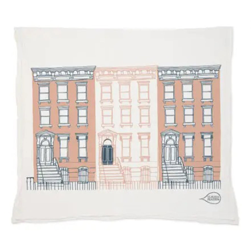 off-white flour sack cotton towel with a row of 3 classic brownstones with stoops in a peach and black color palette
