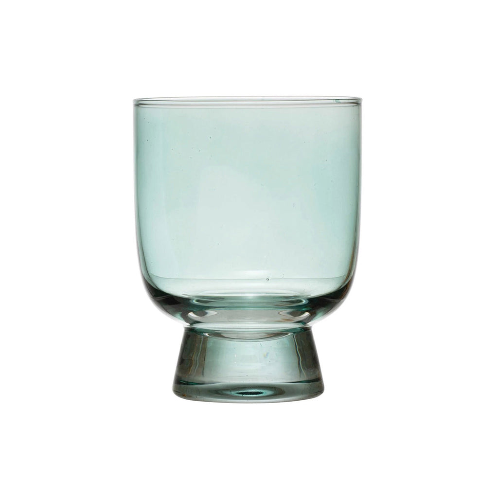 Creative Co-op pale green 6 ounce round footed drinking glass.