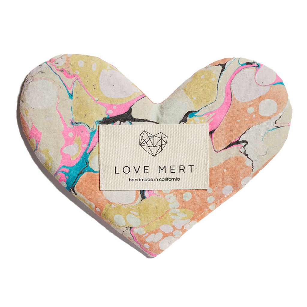 love mert heart shaped love eye pillow in viper color scheme with orange, pink, blue and yellow swirls