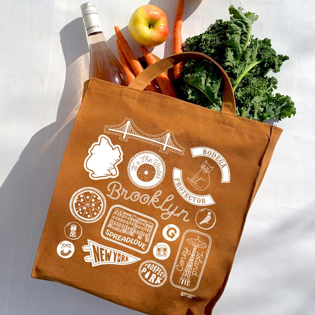 maptote brooklyn reusable caramel cotton canvas shopper tote bag with veggies and a bottle