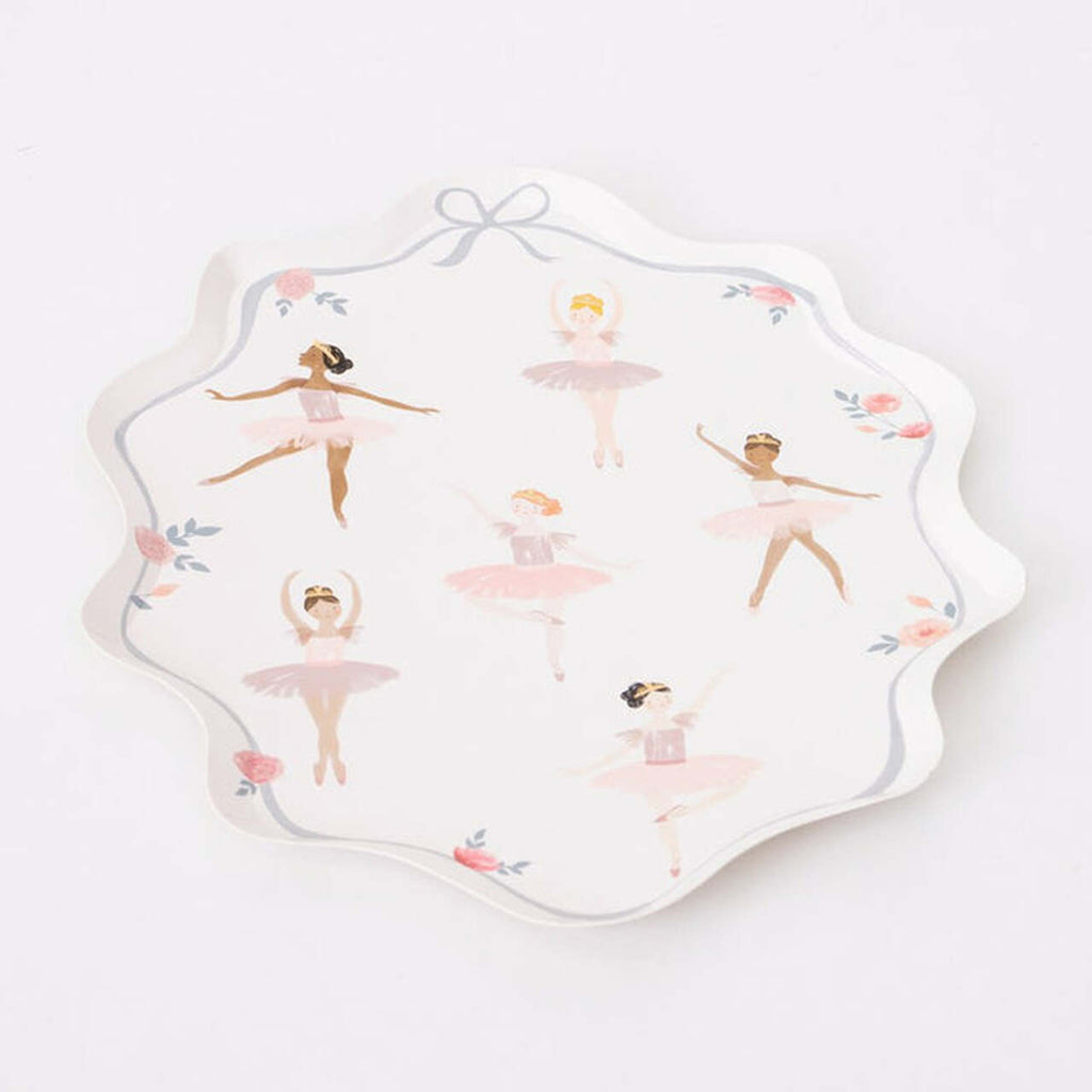 meri meri large paper party plates with ballerinas in pink outfits in different poses on a white plate with wavy edges