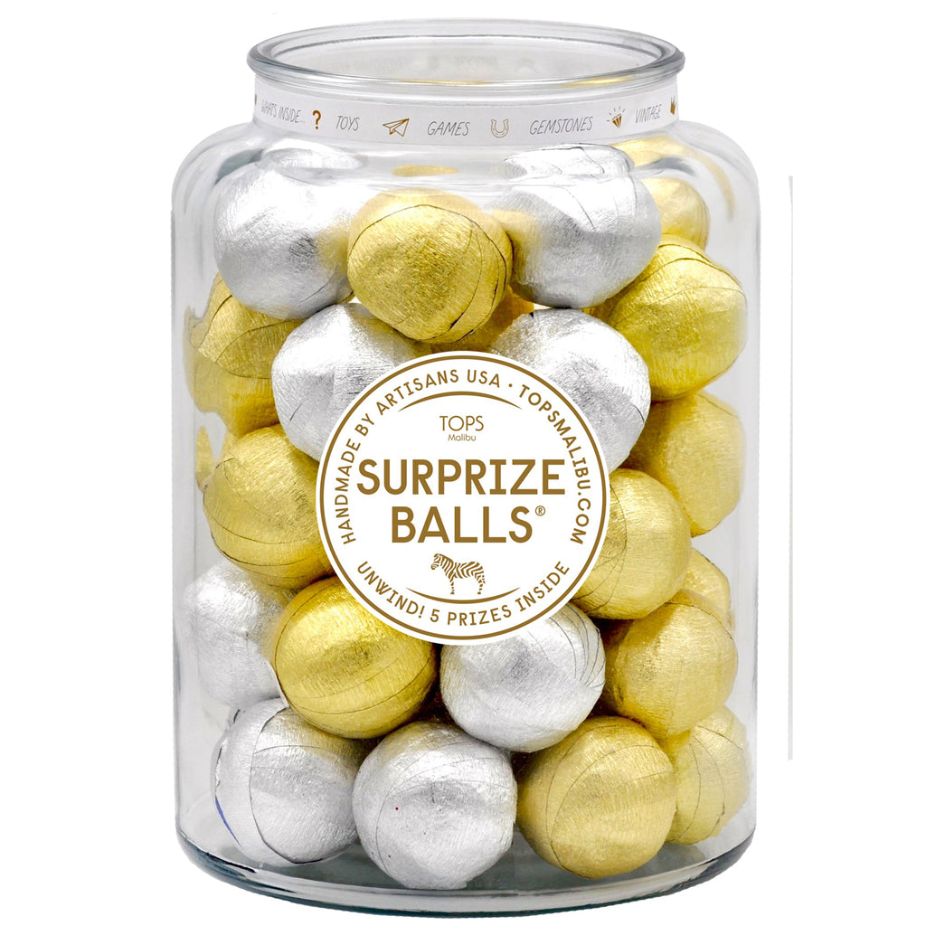 Tops Malibu Mini gold and silver surprize balls in a glass jar.