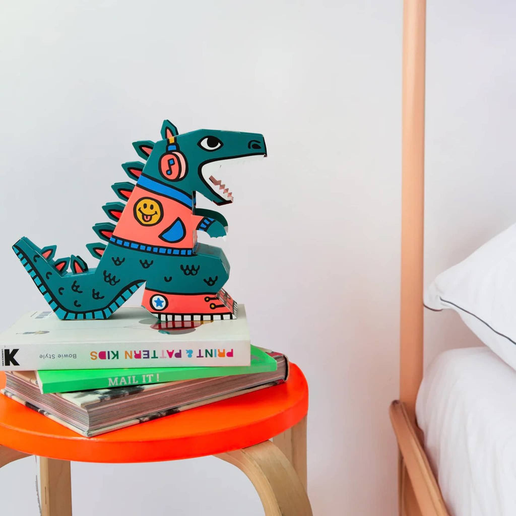 OMY Dino 3D Lamp DIY kit, completed lamp on bedside stool.