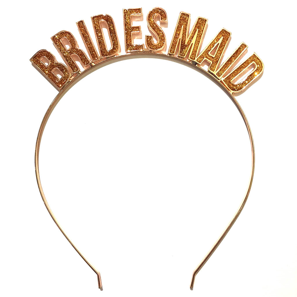 Slant Collections Bridesmaid headband in rose gold toned metal with rose gold glitter letters.