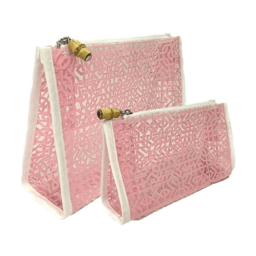 TRVL set of 2 clear plastic zip pouches with pink lattice design, front angle view.