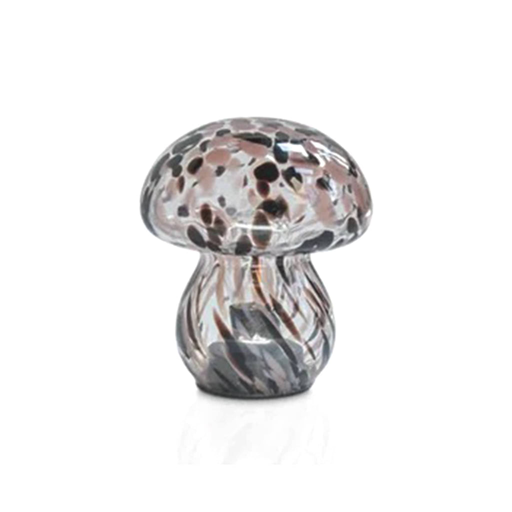 Clear glass with pink and dark purple tones mushroom-shaped cordless led table lamp on a white background.