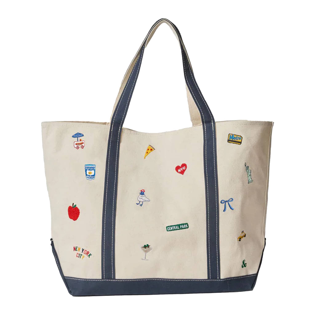 Natural cotton canvas tote bag with various NYC icons embroidered, front view. on a white background.