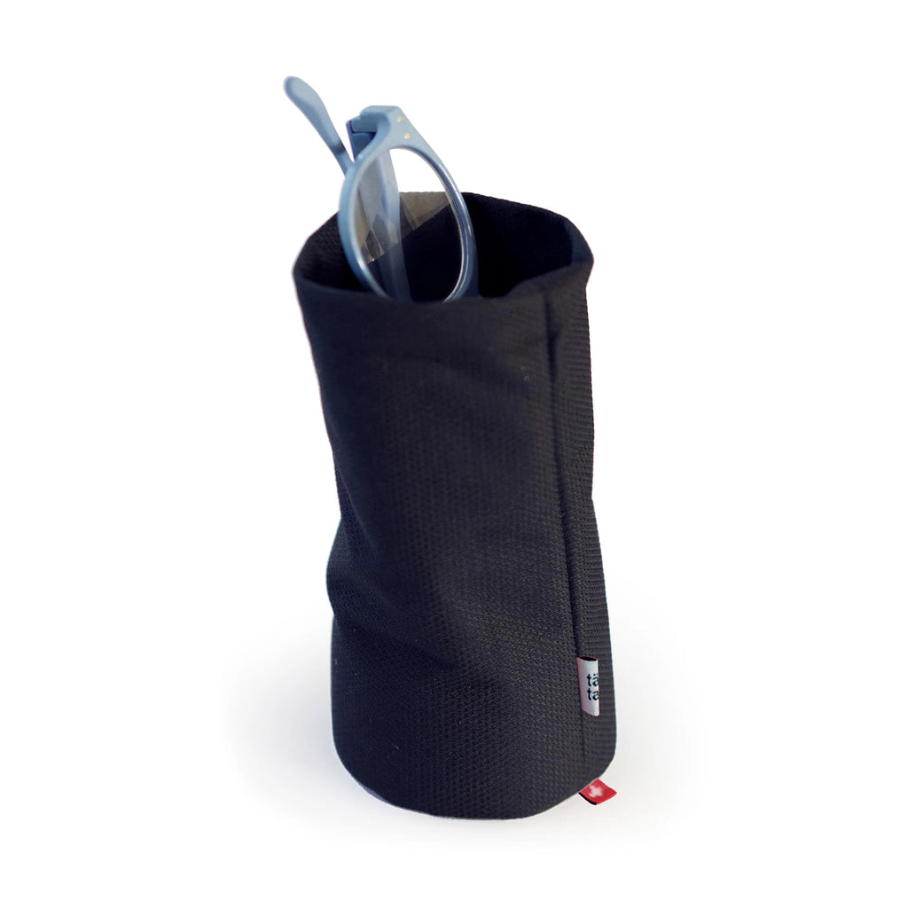 Ameico Tat Tat Sacco Multi-Purpose soft-sided stand-up storage pouch in black with blue frame eyeglasses inside.