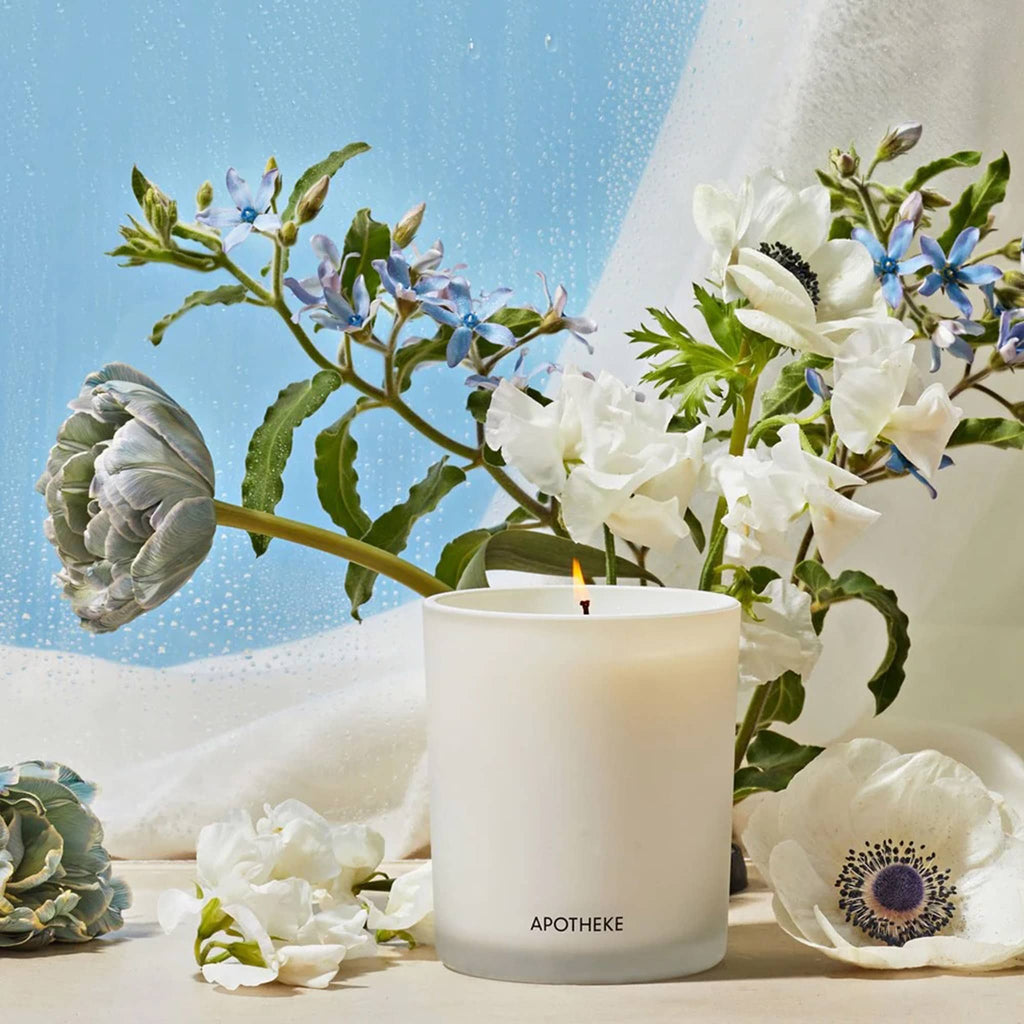 Apotheke Canvas scented soy wax blend classic candle with flowers.