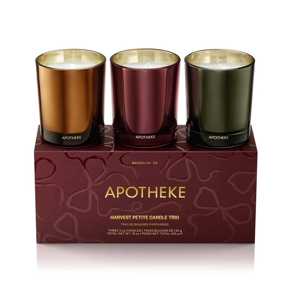 Apotheke Harvest Petite Candle Trio set, candles on top of red box with bows.