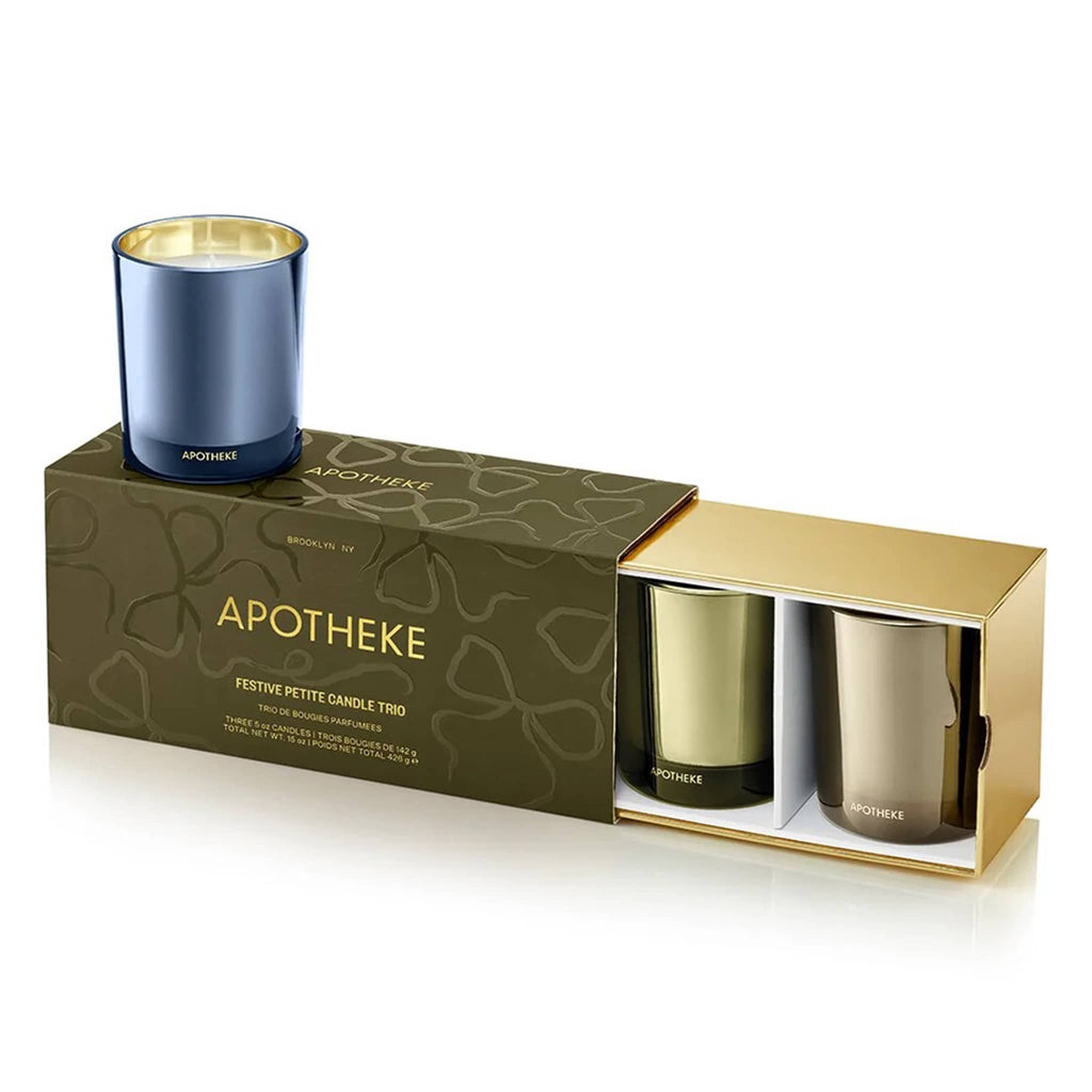 Apotheke candle set with two candles in a box and one blue one on top, on a white background.