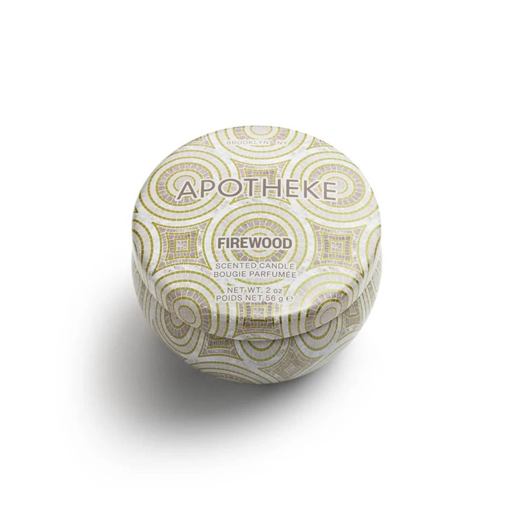 Apotheke Firewood scented limited edition soy blend candle in tan Art Deco printed 2 ounce mini tin with lid.