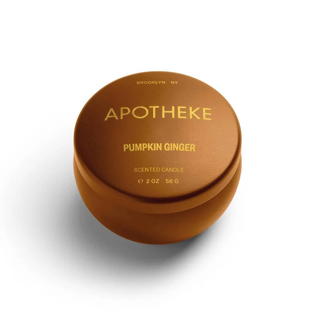 Apotheke 2 ounce Pumpkin Ginger scented soy wax blend candle in umber metal mini tin with lid on.