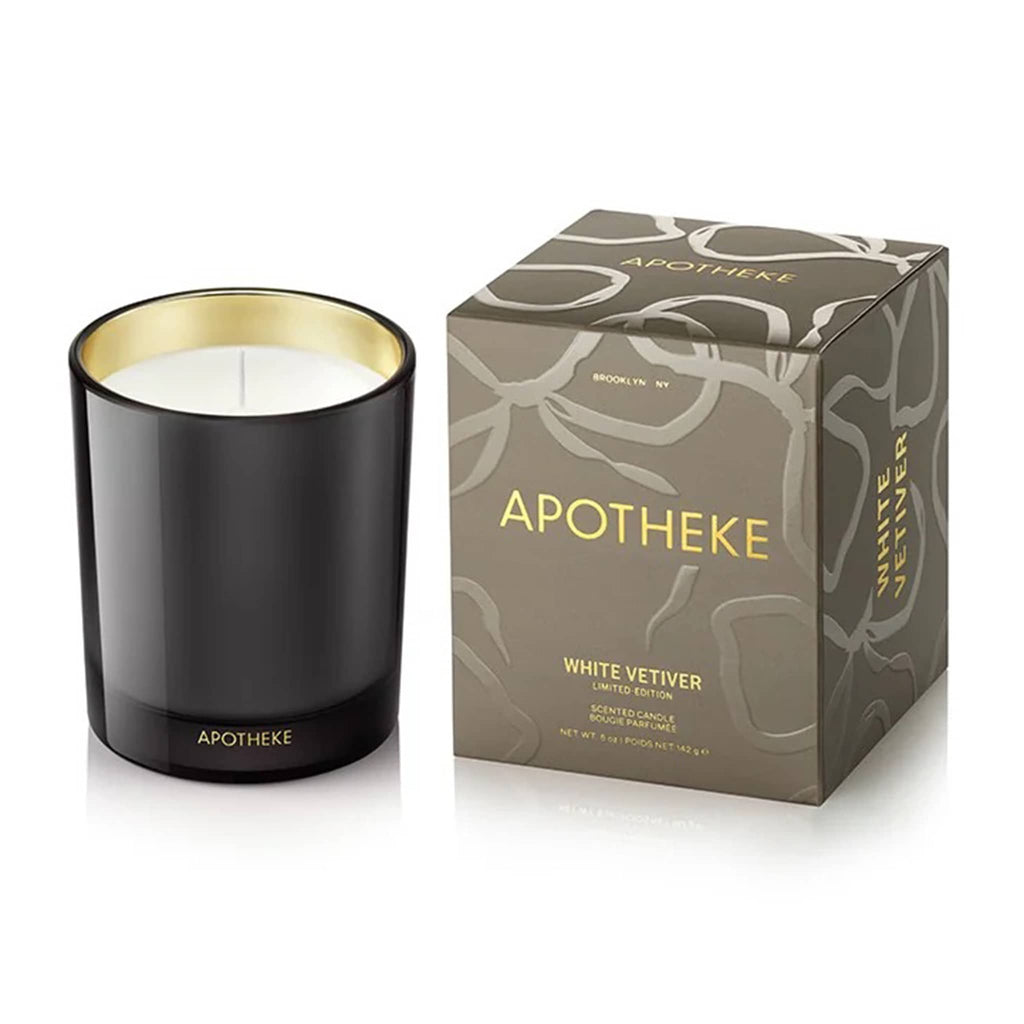 Apotheke White Vetiver candle in slate gray metallic vessel with packaging on a white background.