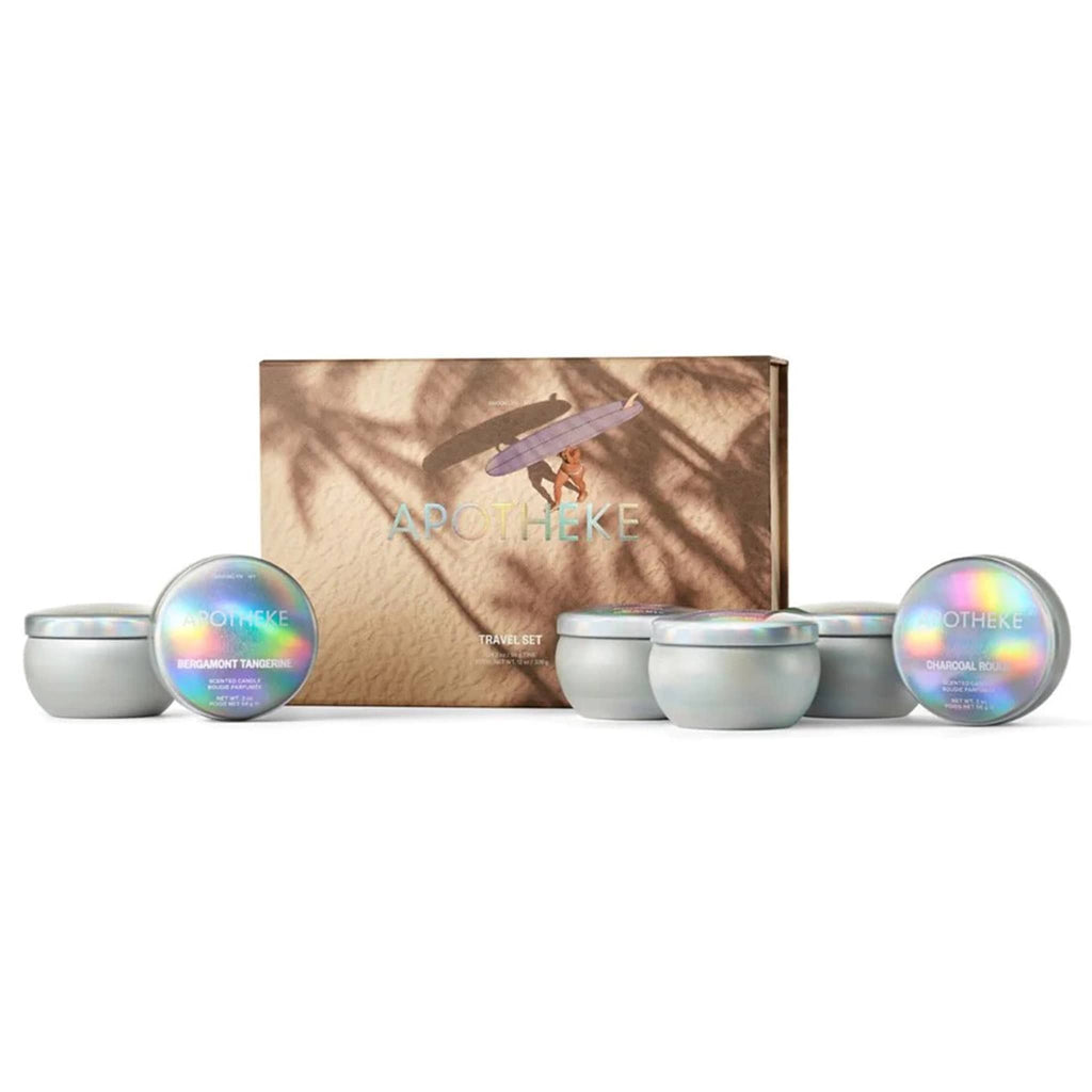 Apotheke x League Creative Co. Travel Set with 6 mini 2 ounce scented soy wax blend candles in iridescent tins with illustrated gift box.