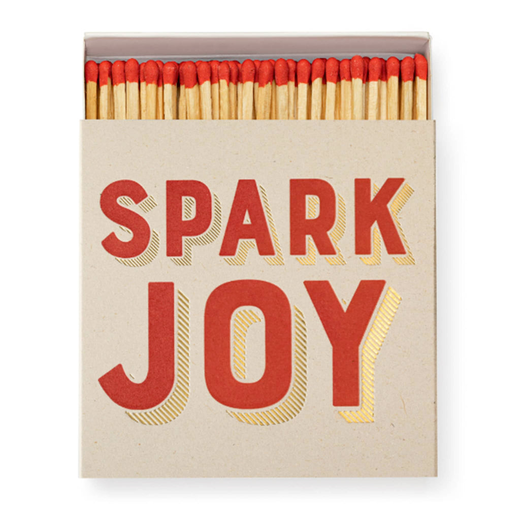 Archivist Gallery Spark Joy square match box with red-tipped wood safety matches, front view.