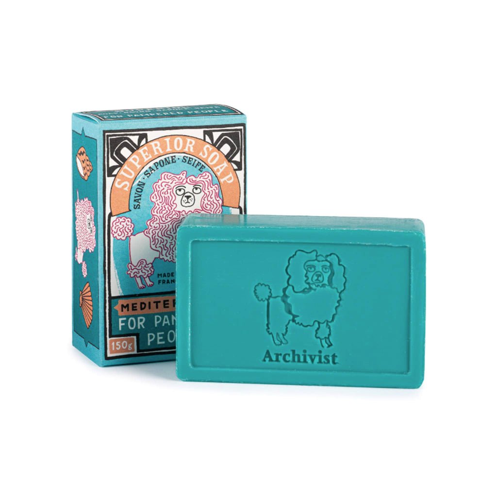 Archivist Gallery Mediterranean Scented Bar Hand Soap with illustrated box packaging, soap bar is teal blue with a poodle imprint.