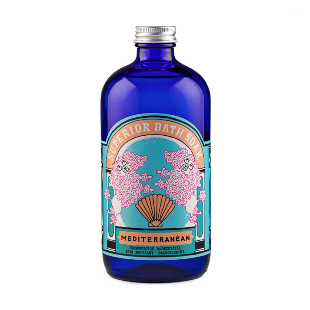 Archivist Gallery Mediterranean scented bath soak in blue bottle packaging with teal and orange label with a pink poodle illustrations, front view.