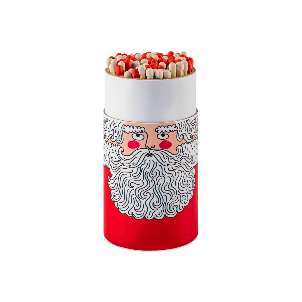 Red and white cylindrical container with a Santa Claus face design, filled with red and white tipped matches, on a white background.