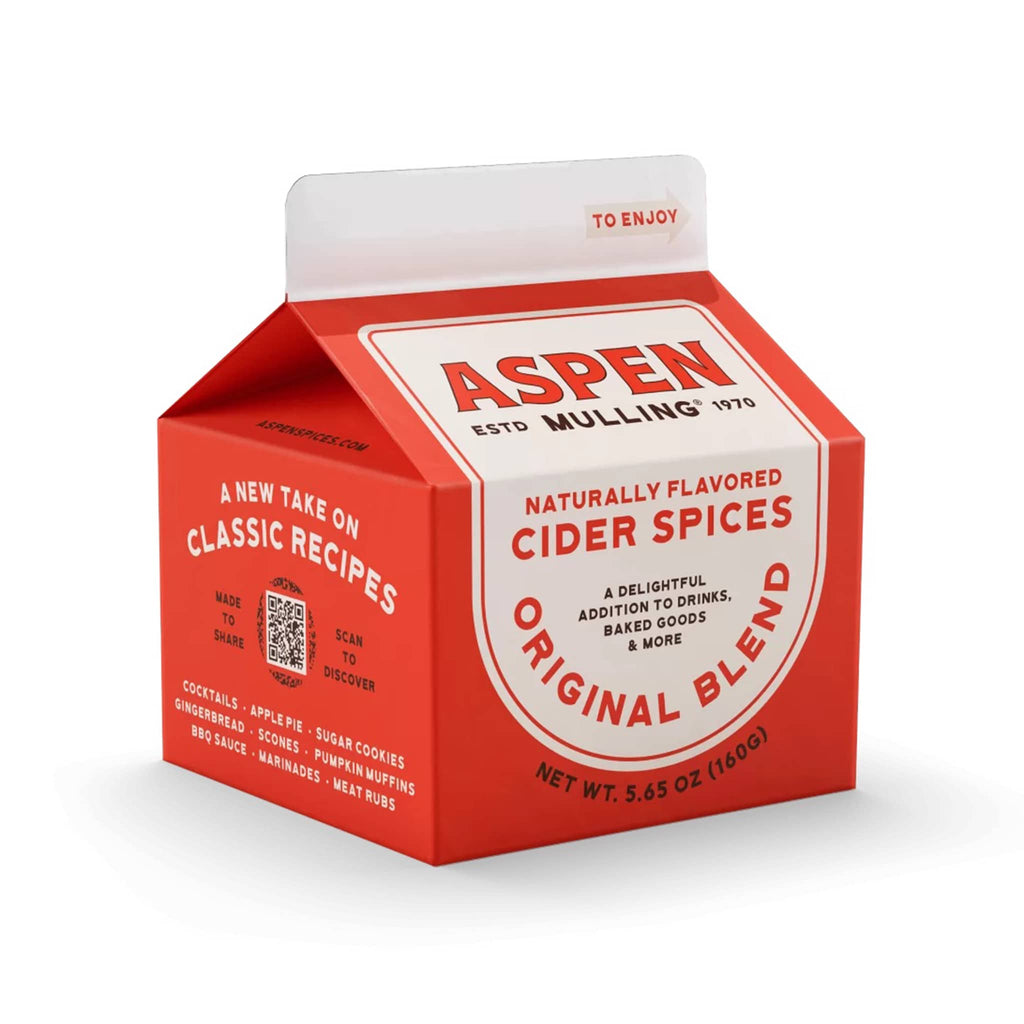 Red and white carton of Aspen Mulling cider spices on a white background.