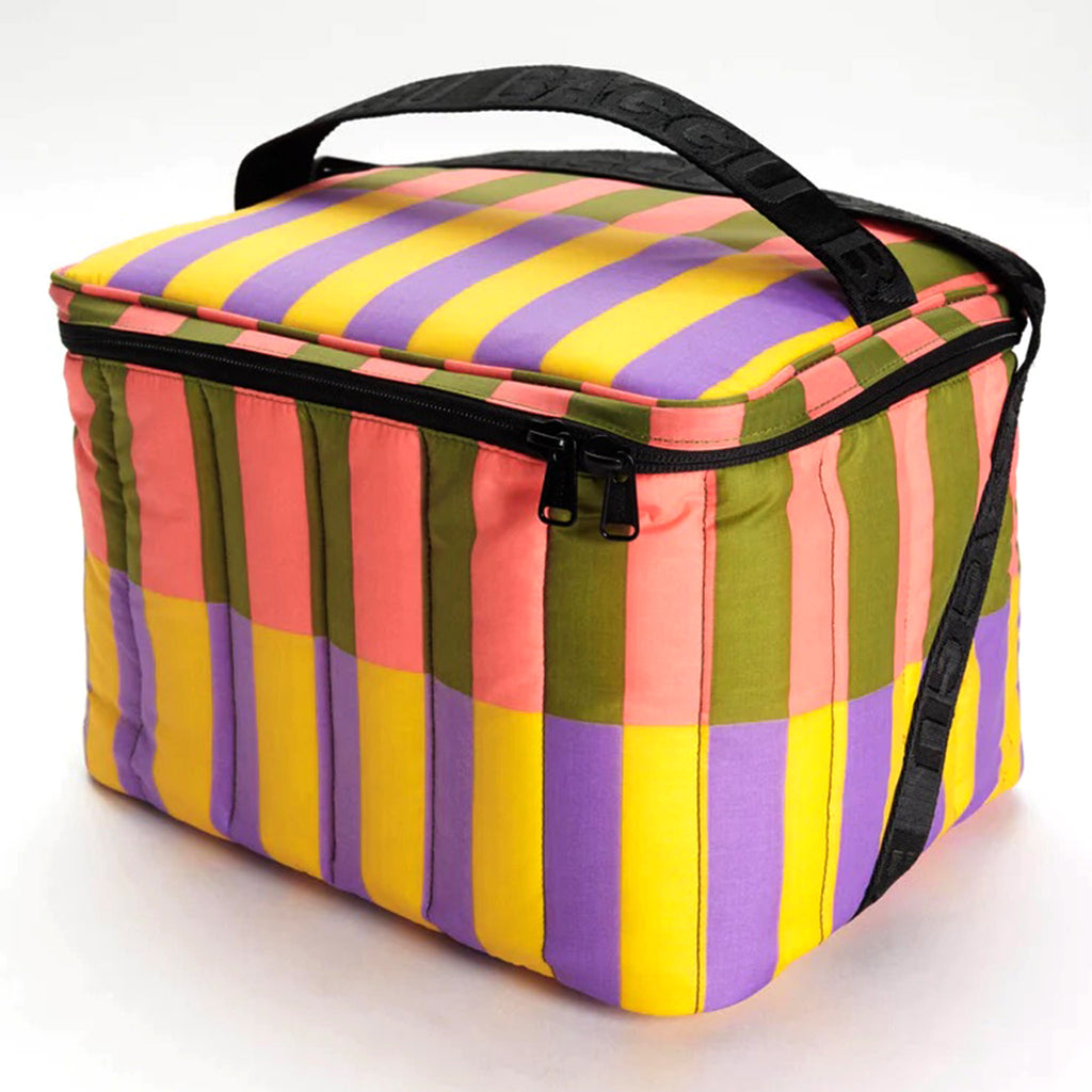 Baggu Insulated Puffy Cooler Bag with Sunset Quilt Stripe print in coral, olive green, yellow and purple with black zipper, shoulder strap and handle, front view.