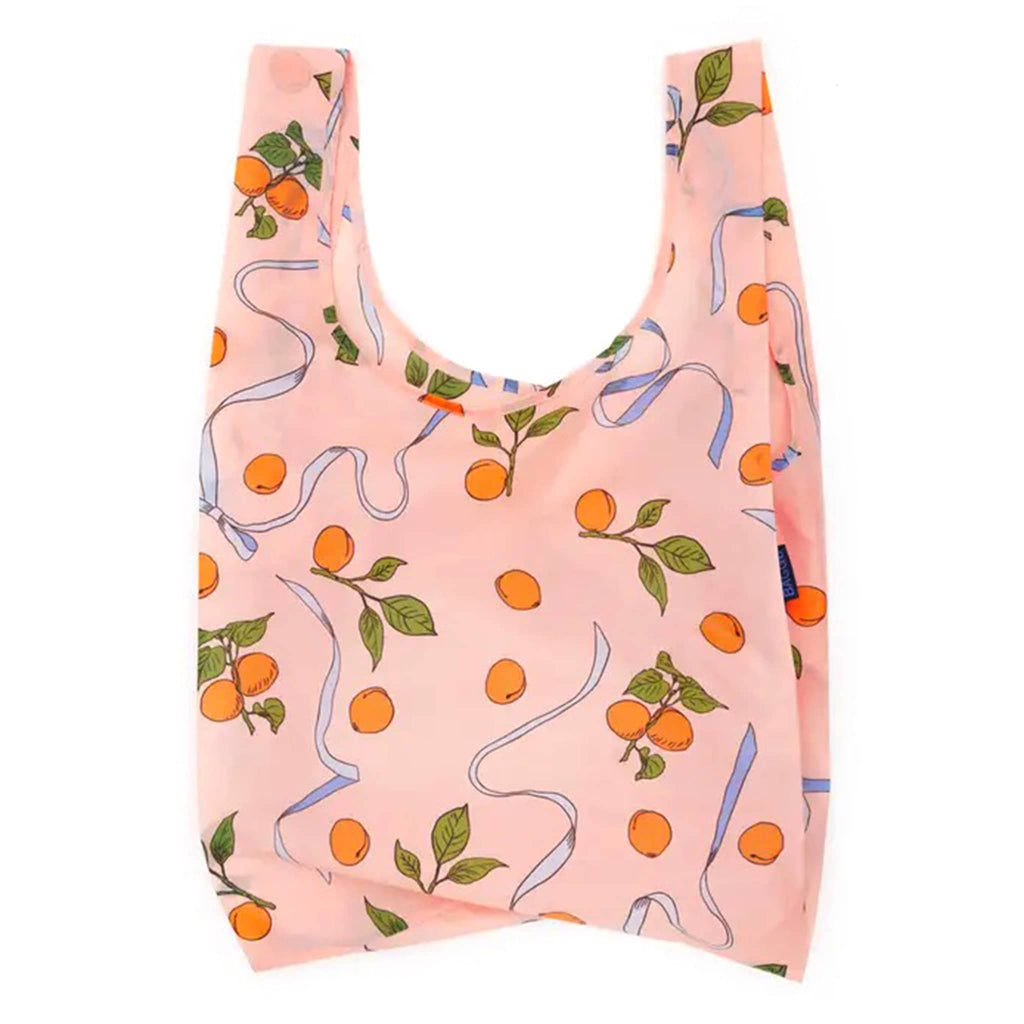 Standard Baggu in Apricots and Ribbons print, unfolded.