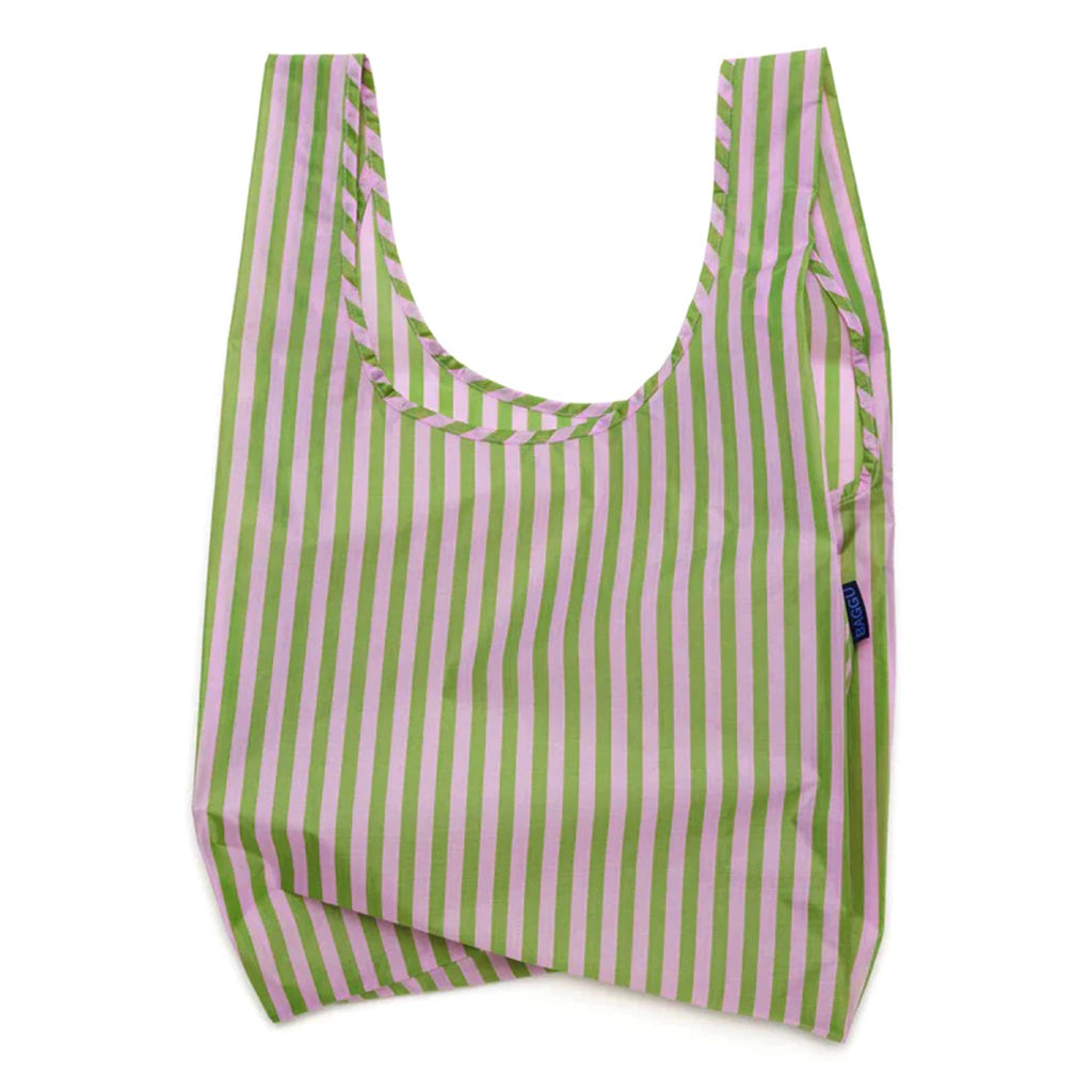 Baggu standard size eco-friendly recycled ripstop nylon reusable tote bag with lilac and green avocado candy stripe print, unfolded.