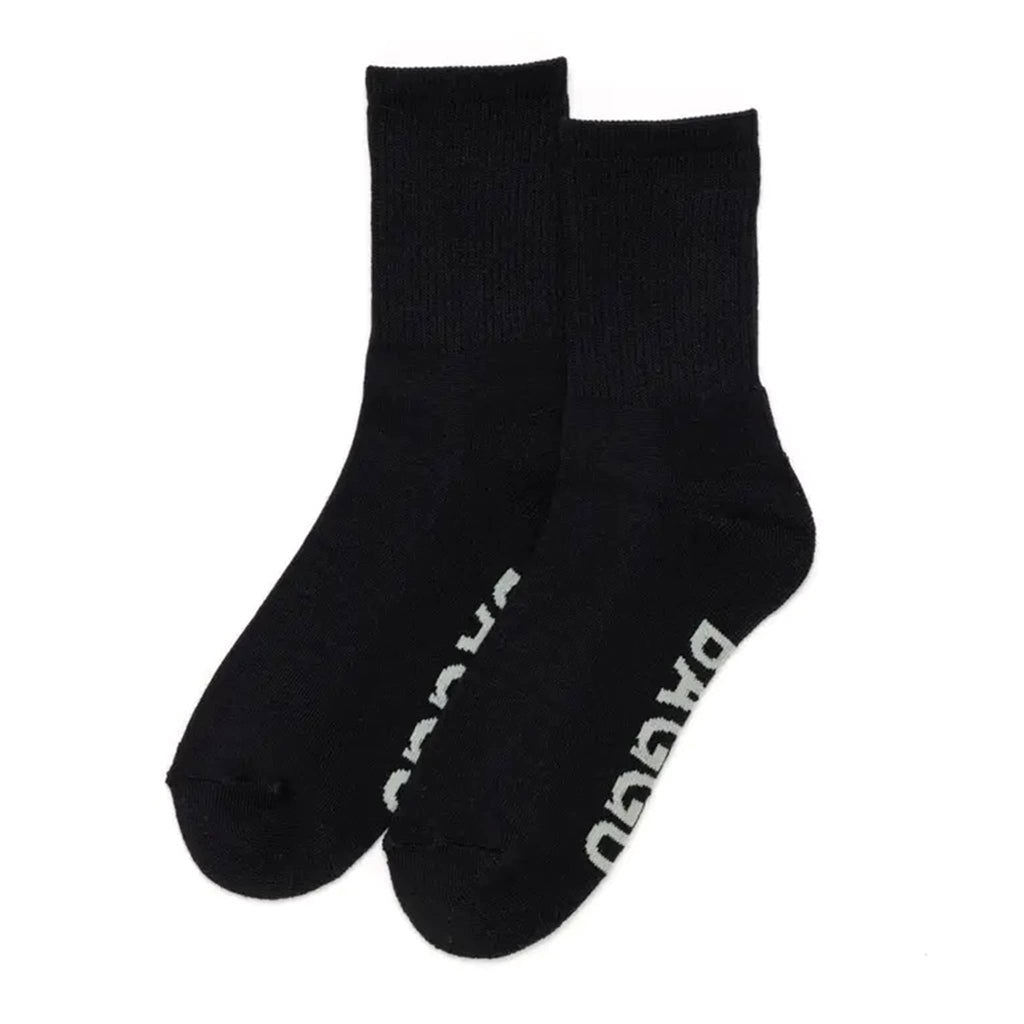 Black ribbed socks with white 'Baggu' branding on a white background.