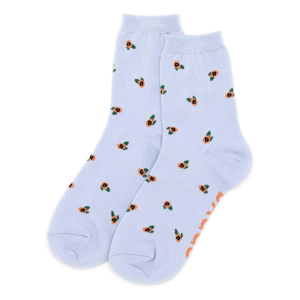 Baggu bamboo rayon unisex Rosette crew socks with small peach flowers on a pale blue background, flat.