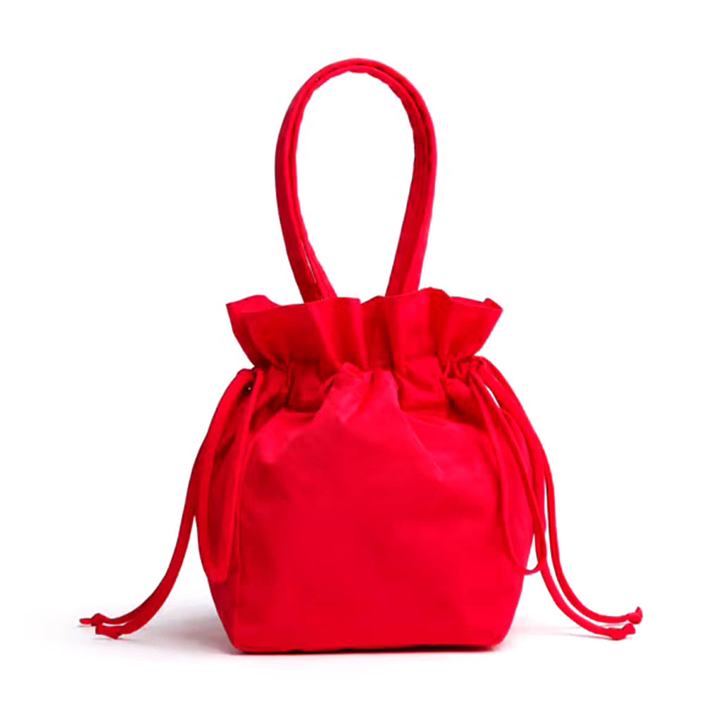 Baggu candy apple red recycled nylon drawstring bag, front view, on a white background.