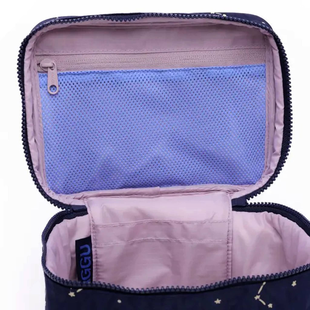 Baggu large cosmetic case with constellation midnight print, open with detail of interior pockets.