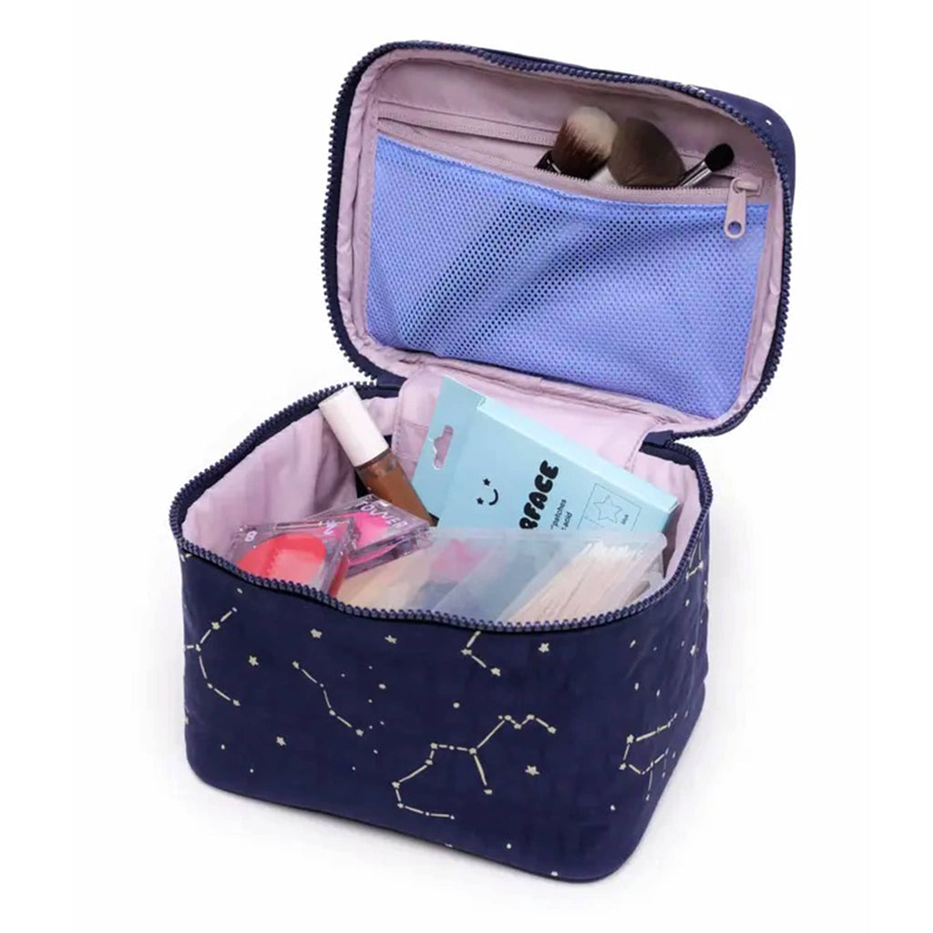 Baggu large cosmetic case with constellation midnight print, open with cosmetics inside.