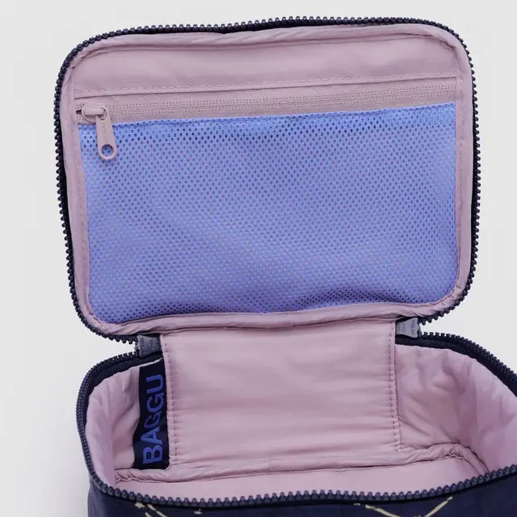 Baggu small cosmetic case with constellation midnight print, open with detail of interior zip mesh pocket.