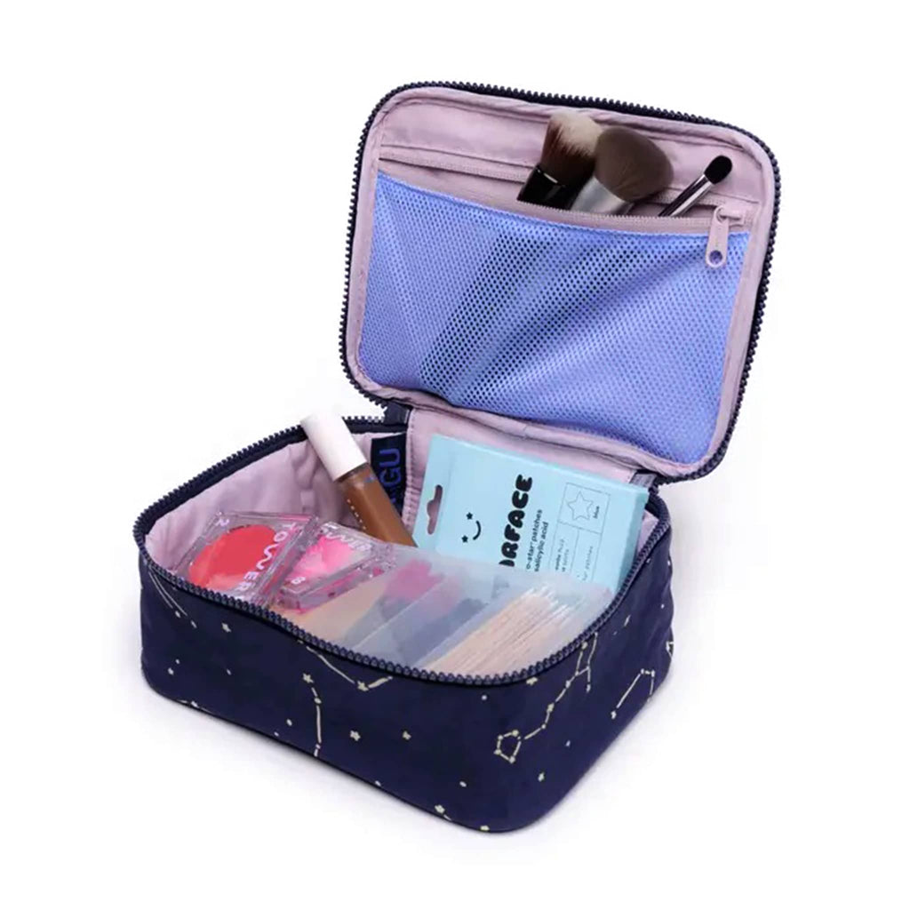 Baggu small cosmetic case with constellation midnight print, open with makeup inside.