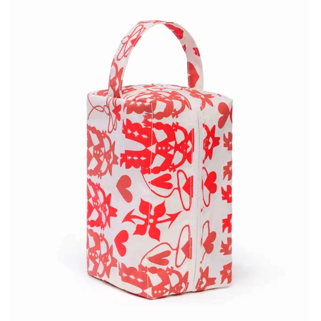Baggu Cowgirl Dopp Kit, standing upright with handle.